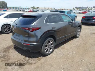 2021 Mazda CX-30 Select with VIN 3MVDMABL5MM210517, listed as a IAAI auction lot 42245033 with 191,303 mi miles and . Bid and sale history available at DreamBid. Image 4.