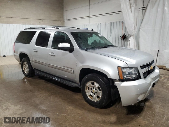 2013 Chevrolet Suburban LT with VIN 1GNSKJE76DR119873, listed as a Copart auction lot 53239445 with 197,172 mi miles and Salvage Title. Bid and sale history available at DreamBid. Image 4.