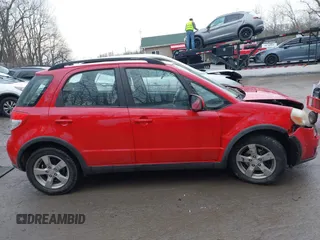 2011 Suzuki SX4 Crossover with VIN JS2YB5A39B6301570, listed as a IAAI auction lot 41666875 with 103,724 mi miles. Bid and sale history available at carsss.com. Image 13.