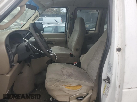 2006 Ford Econoline Passenger XL with VIN 1FBNE31L36HA02924, listed as a Copart auction lot 79903244 with 217,831 mi miles and Salvage title. Bid and sale history available at DreamBid. Image 7.