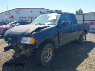 2001 Ford F-150 XL z VIN 2FTRX18L41CA04375, wystawiony jako IAAI lot #42443767 z przebiegiem 345 170 mil mil oraz . Historia ofert i sprzedaży dostępna na DreamBid. Obrazek 2.