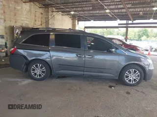 2012 Honda Odyssey EX-L with VIN 5FNRL5H67CB016934, listed as a IAAI auction lot 42405714 with 248,512 mi miles and . Bid and sale history available at DreamBid. Image 13.
