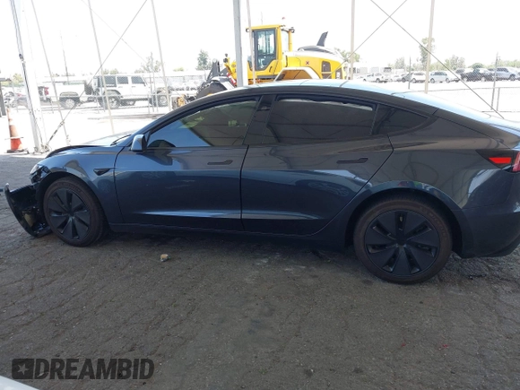 2025 Tesla Model 3 Long Range with VIN 5YJ3E1EA5SF978214, listed as a IAAI auction lot 42525444 with 6,489 mi miles and . Bid and sale history available at DreamBid. Image 15.