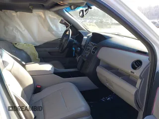2013 Honda Pilot EX-L with VIN 5FNYF3H5XDB030830, listed as a IAAI auction lot 41079628 with 144,233 mi miles and . Bid and sale history available at DreamBid. Image 5.