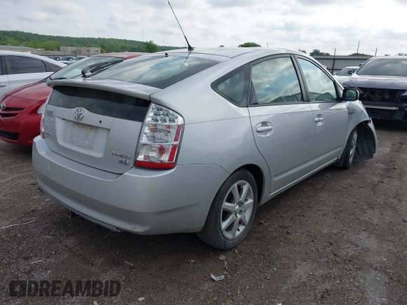 2007 Toyota Prius z VIN JTDKB20U873273942, wystawiony jako IAAI lot #42113046 z przebiegiem 126 635 mil mil oraz . Historia ofert i sprzedaży dostępna na DreamBid. Obrazek 4.