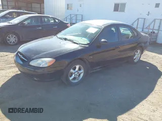 2000 Ford Taurus SE with VIN 1FAFP5321YG249478, listed as a IAAI auction lot 41686339 with 221,015 mi miles and . Bid and sale history available at DreamBid. Image 2.