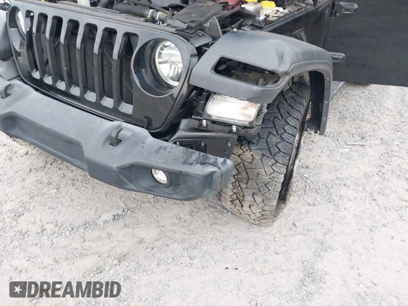 2021 Jeep Wrangler Unlimited Willys z VIN 1C4HJXDM5MW859724, wystawiony jako IAAI lot #42311203 z przebiegiem 71 887 mil mil oraz . Historia ofert i sprzedaży dostępna na DreamBid. Obrazek 6.