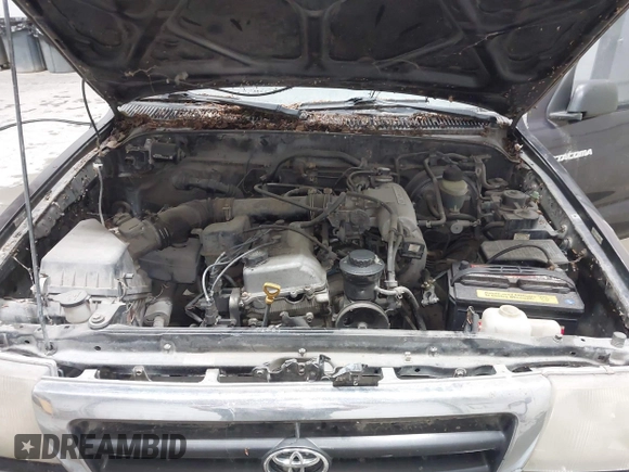 1999 Toyota Tacoma with VIN 4TAWM72N5XZ433296, listed as a IAAI auction lot 42595432 with 233,075 mi miles and . Bid and sale history available at DreamBid. Image 10.
