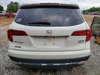 2017 Honda Pilot Touring z VIN 5FNYF6H92HB067140, wystawiony jako Copart lot #55757925 z przebiegiem 132 425 mil mil oraz Szkoda całkowita • Salvage title. Historia ofert i sprzedaży dostępna na DreamBid. Obrazek 6.