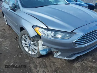 2020 Ford Fusion SE z VIN 3FA6P0LU8LR163896, wystawiony jako IAAI lot #41994803 z przebiegiem 89 892 mil mil oraz . Historia ofert i sprzedaży dostępna na DreamBid. Obrazek 6.