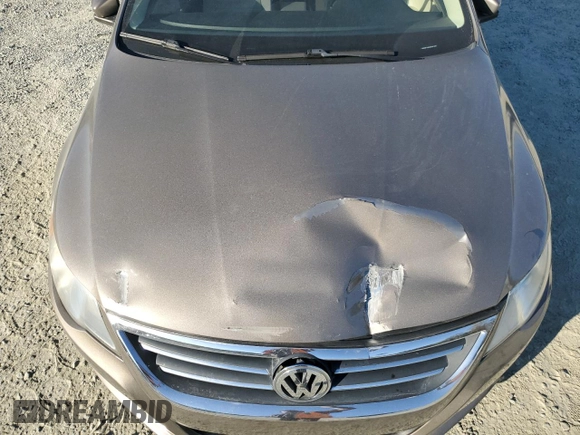 2010 Volkswagen CC Sport with VIN WVWMN7AN3AE541988, listed as a Copart auction lot 77670794 with 100,277 mi miles and Salvage Title. Bid and sale history available at DreamBid. Image 12.