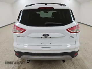 2014 Ford Escape SE с VIN 1FMCU9G93EUE26268, выставлен на аукционе Copart как лот 62872595 с пробегом 174 112 миль миль и Чистый • Clean title. История ставок и продаж доступна на DreamBid. Изображение 6.