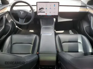 2021 Tesla Model 3 Standard Range Plus with VIN 5YJ3E1EA2MF985463, listed as a Copart auction lot 53311455 with 23,176 mi miles and Clean Title. Bid and sale history available at DreamBid. Image 8.