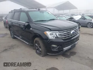 2021 Ford Expedition XLT with VIN 1FMJU1JT7MEA71014, listed as a IAAI auction lot 41219835 with 93,725 mi miles. Bid and sale history available at carsss.com. Image 1.
