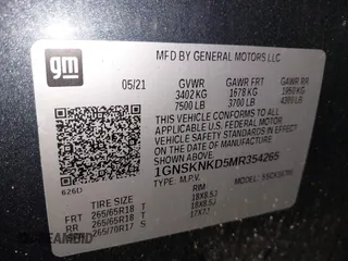 2021 Chevrolet Tahoe LT z VIN 1GNSKNKD5MR354265, wystawiony jako IAAI lot #42331890 z przebiegiem 106 250 mil mil oraz . Historia ofert i sprzedaży dostępna na DreamBid. Obrazek 9.