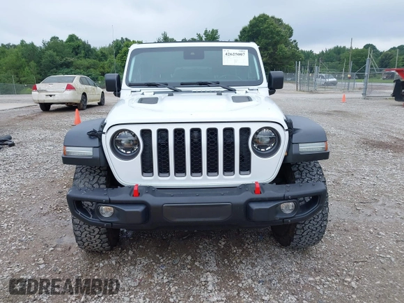 2021 Jeep Wrangler Unlimited Rubicon with VIN 1C4JJXFM9MW774142, listed as a IAAI auction lot 42625007 with 42,318 mi miles and . Bid and sale history available at DreamBid. Image 12.