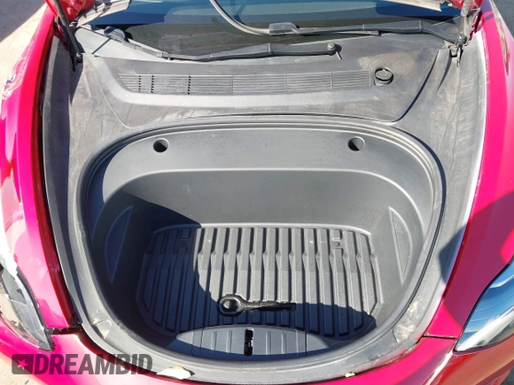 2021 Tesla Model 3 Long Range with VIN 5YJ3E1EBXMF990242, listed as a IAAI auction lot 41674222 with 24,554 mi miles and . Bid and sale history available at DreamBid. Image 10.
