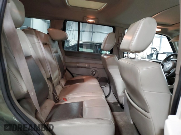 2007 Jeep Commander Limited z VIN 1J8HG58247C657760, wystawiony jako Copart lot #53749325 z przebiegiem 210 610 mil mil oraz Czysty tytuł • Clean title. Historia ofert i sprzedaży dostępna na DreamBid. Obrazek 11.