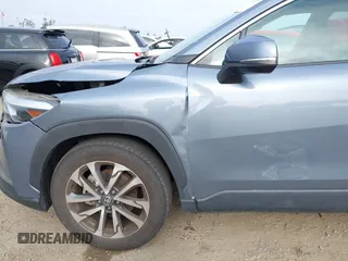 2022 Toyota Corolla Cross XLE with VIN 7MUDAABG6NV007009, listed as a IAAI auction lot 42409061 with 37,178 mi miles and . Bid and sale history available at DreamBid. Image 21.