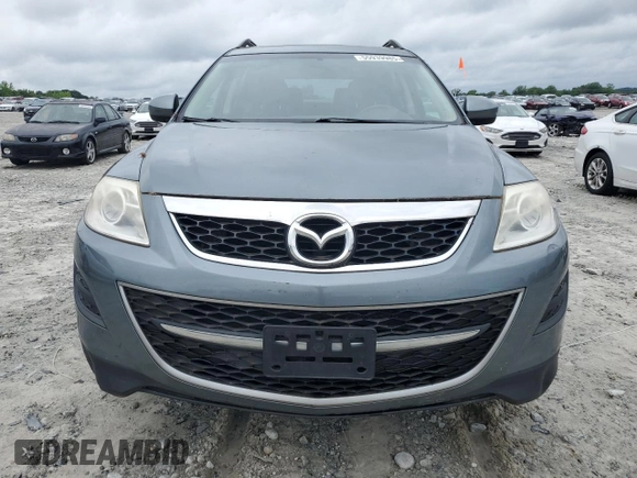 2012 Mazda CX-9 Touring z VIN JM3TB3CV0C0349512, wystawiony jako Copart lot #55939985 z przebiegiem 136 686 mil mil oraz Czysty tytuł • Clean title. Historia ofert i sprzedaży dostępna na DreamBid. Obrazek 5.