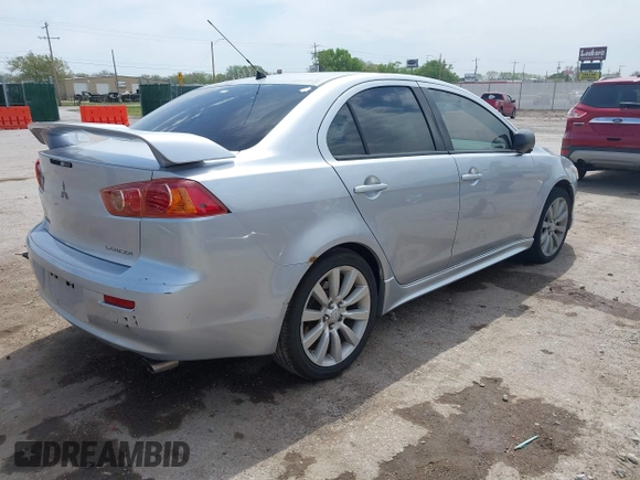 2008 Mitsubishi Lancer GTS with VIN JA3AU86U28U026507, listed as a IAAI auction lot 42033357 with 153,589 mi miles. Bid and sale history available at carsss.com. Image 4.