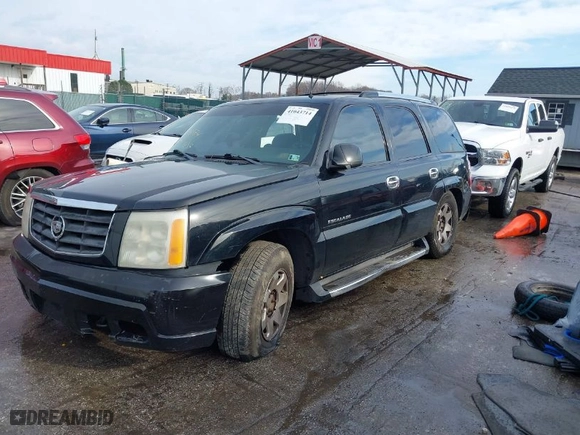 2002 Cadillac Escalade with VIN 1GYEK63N12R220623, listed as a IAAI auction lot 41043714 with 227,937 mi miles. Bid and sale history available at carsss.com. Image 2.