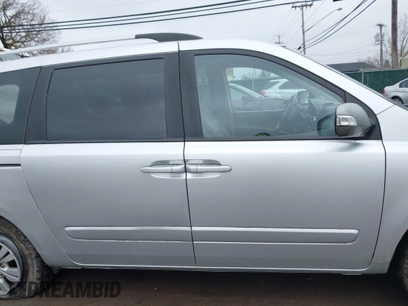 2012 Kia Sedona LX with VIN KNDMG4C72C6485952, listed as a IAAI auction lot 42029147 with 129,296 mi miles. Bid and sale history available at carsss.com. Image 13.