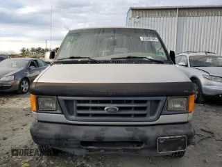 2004 Ford Econoline Passenger XL with VIN 1FMRE11W54HB15178, listed as a Copart auction lot 83088104 with 248,516 mi miles and Salvage Title. Bid and sale history available at DreamBid. Image 5.