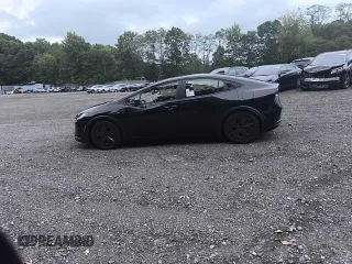 2024 Toyota Prius LE z VIN JTDADABU4R3013862, wystawiony jako Copart lot #74573904 z przebiegiem 6 mil mil oraz Czysty tytuł • Clean title. Historia ofert i sprzedaży dostępna na DreamBid. Obrazek 14.