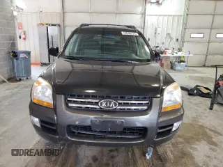 2005 Kia Sportage LX with VIN KNDJE723X57131795, listed as a Copart auction lot 79035214 with 146,746 mi miles and Salvage Title. Bid and sale history available at carsss.com. Image 5.