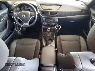 2014 BMW X1 sDrive28i z VIN WBAVM1C57EVW50653, wystawiony jako Copart lot #57309385 z przebiegiem Nie podano mil oraz Szkoda całkowita • Salvage title. Historia ofert i sprzedaży dostępna na DreamBid. Obrazek 8.