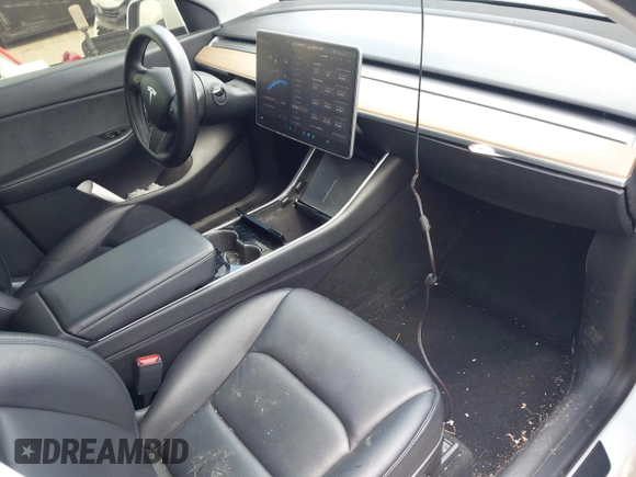 2021 Tesla Model Y Performance with VIN 5YJYGDEF9MF081798, listed as a IAAI auction lot 42033358 with 64,679 mi miles and . Bid and sale history available at DreamBid. Image 5.