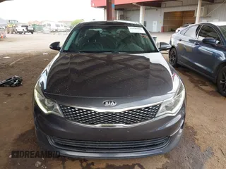 2017 Kia Optima EX with VIN 5XXGU4L36HG125627, listed as a IAAI auction lot 41949580 with 123,548 mi miles. Bid and sale history available at carsss.com. Image 12.