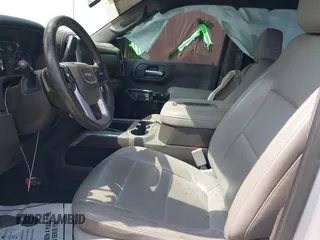 2020 GMC Sierra 1500 SLT z VIN 3GTU9DED9LG299417, wystawiony jako IAAI lot #42168562 z przebiegiem Nie podano mil oraz . Historia ofert i sprzedaży dostępna na DreamBid. Obrazek 5.