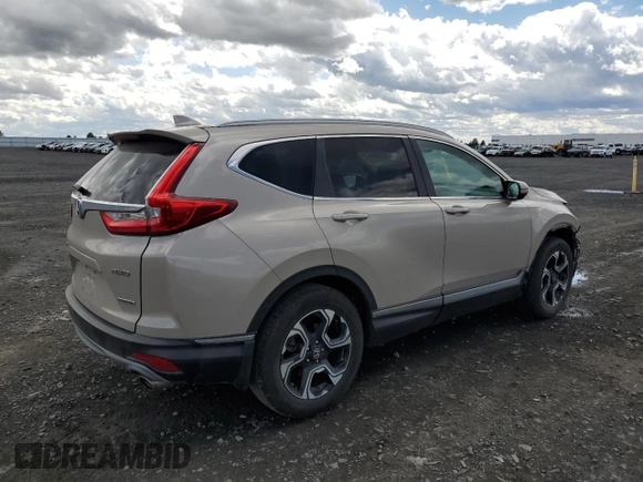 2018 Honda CR-V Touring with VIN 5J6RW2H98JL002657, listed as a Copart auction lot 55075965 with 61,327 mi miles and Salvage Title. Bid and sale history available at DreamBid. Image 3.