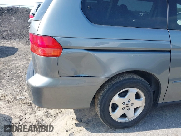 2001 Honda Odyssey EX z VIN 2HKRL18601H532141, wystawiony jako IAAI lot #41981052 z przebiegiem 126 931 mil mil oraz . Historia ofert i sprzedaży dostępna na DreamBid. Obrazek 6.