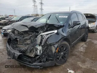 2021 Cadillac XT5 AWD Premium Luxury with VIN 1GYKNDRS9MZ141571, listed as a Copart auction lot 46450135 with 92,668 mi miles and Salvage Title. Bid and sale history available at carsss.com. Image 1.