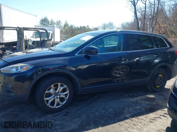 2015 Mazda CX-9 Touring with VIN JM3TB3CV1F0465919, listed as a IAAI auction lot 41704700 with 139,075 mi miles. Bid and sale history available at carsss.com. Image 14.