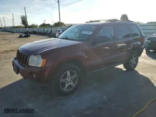 2007 Jeep Grand Cherokee Laredo with VIN 1J8GR48K07C649302, listed as a Copart auction lot 82167894 with 255,780 mi miles and Clean Title. Bid and sale history available at carsss.com. Image 1.