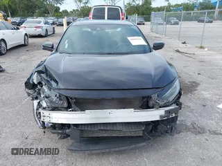 2020 Honda Civic Si with VIN 2HGFC1E50LH702493, listed as a IAAI auction lot 40609245 with 62,660 mi miles and . Bid and sale history available at DreamBid. Image 12.