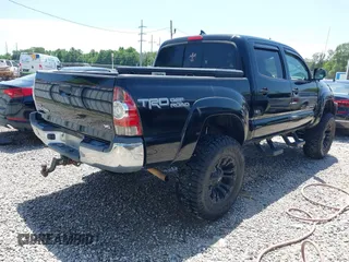 2015 Toyota Tacoma with VIN 5TFLU4EN9FX143428, listed as a IAAI auction lot 42173370 with 200,447 mi miles and . Bid and sale history available at DreamBid. Image 4.
