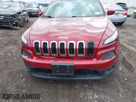 2014 Jeep Cherokee Latitude with VIN 1C4PJMCS0EW261021, listed as a IAAI auction lot 41986701 with 114,633 mi miles. Bid and sale history available at carsss.com. Image 9.