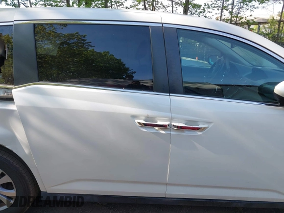 2014 Honda Odyssey EX-L with VIN 5FNRL5H63EB064854, listed as a IAAI auction lot 42102704 with 148,536 mi miles and . Bid and sale history available at carsss.com. Image 13.
