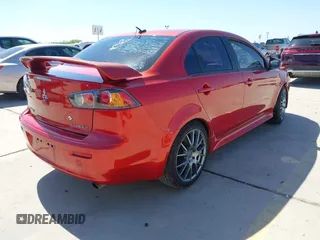 2015 Mitsubishi Lancer GT with VIN JA32U8FW9FU014308, listed as a IAAI auction lot 41982416 with 227,574 mi miles. Bid and sale history available at carsss.com. Image 4.