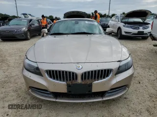 2012 BMW Z4 sDrive35i with VIN WBALM7C5XCE384505, listed as a Copart auction lot 74933904 with 0 mi miles and Salvage Title. Bid and sale history available at carsss.com. Image 5.