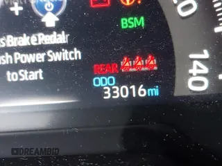2021 Toyota RAV4 Hybrid XSE with VIN 2T3E6RFV4MW021009, listed as a IAAI auction lot 41940278 with 33,016 mi miles and . Bid and sale history available at DreamBid. Image 15.