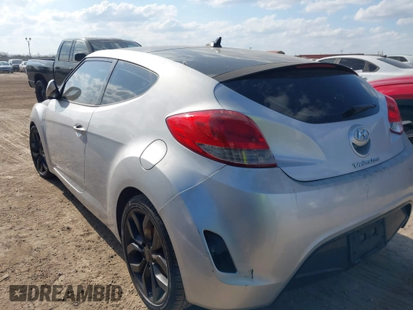 2012 Hyundai Veloster w/Gray Int with VIN KMHTC6AD0CU068400, listed as a IAAI auction lot 41493521 with 72,682 mi miles and . Bid and sale history available at DreamBid. Image 3.