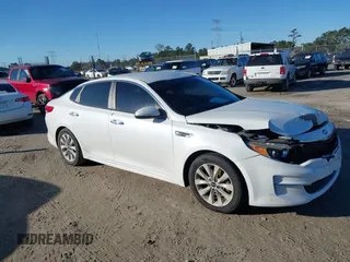 2016 Kia Optima LX with VIN 5XXGT4L36GG005859, listed as a IAAI auction lot 41053277 with 127,783 mi miles. Bid and sale history available at carsss.com. Image 13.