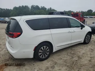 2023 Chrysler Pacifica Hybrid Limited with VIN 2C4RC1S70PR543587, listed as a Copart auction lot 60439795 with 11,558 mi miles and Salvage title. Bid and sale history available at DreamBid. Image 3.