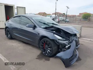 2022 Tesla Model 3 Performance with VIN 5YJ3E1EC3NF296891, listed as a IAAI auction lot 41808329 with 82,682 mi miles and . Bid and sale history available at DreamBid. Image 1.